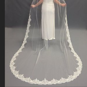 Dareth Colburn cathedral length veil with pearl and lace edge